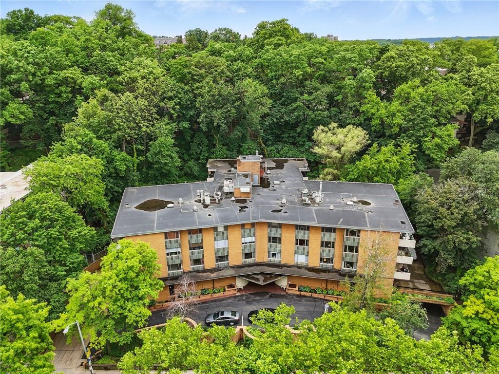 5048 Fifth Avenue, Unit 101 Pittsburgh, PA 15232 - Photo 3 of 24 an aerial view of a house with a yard