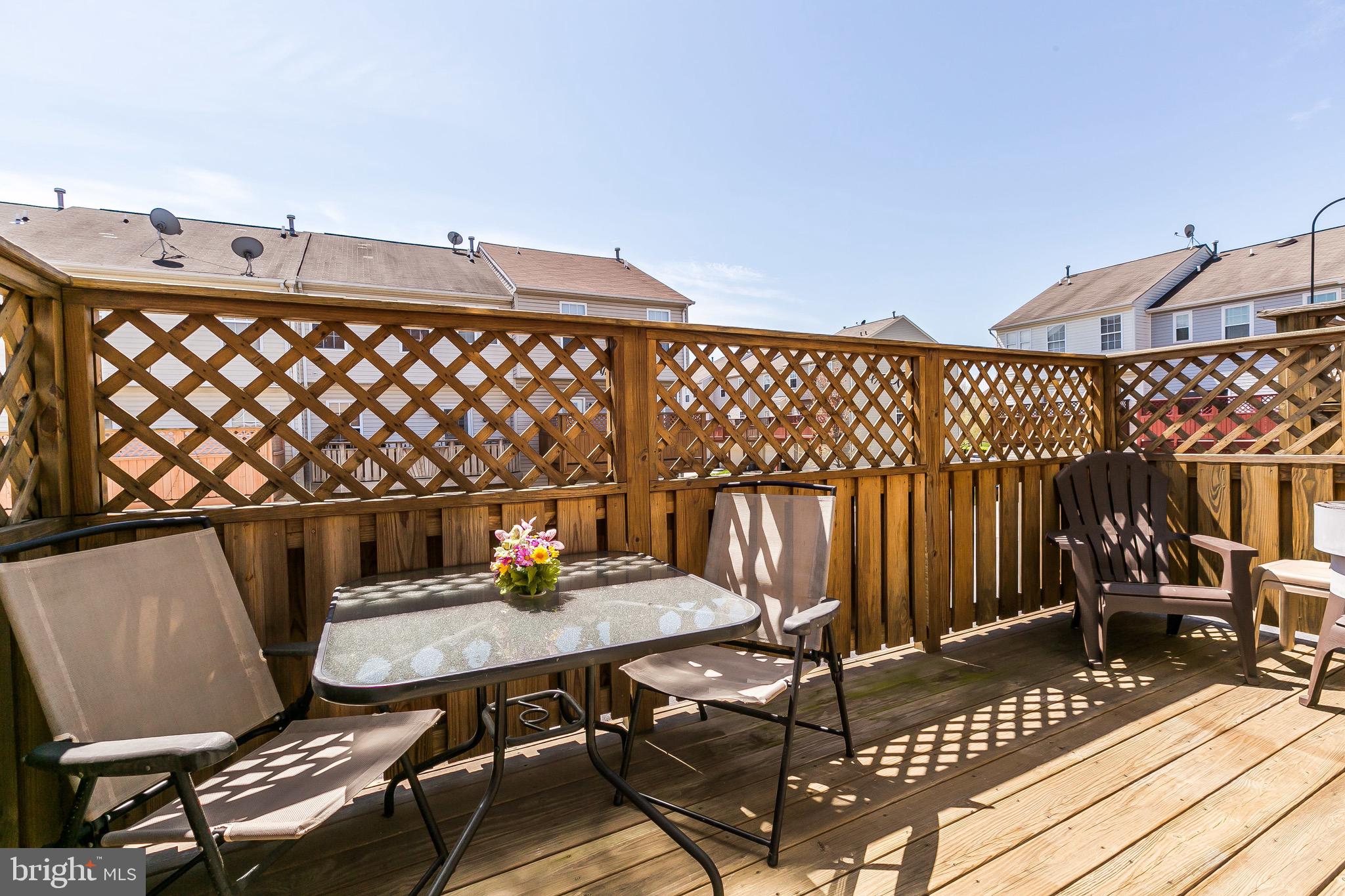 5003 Leasdale Road Baltimore, MD 21237 - Photo 15 of 38 Back Deck w/ Privacy Fence