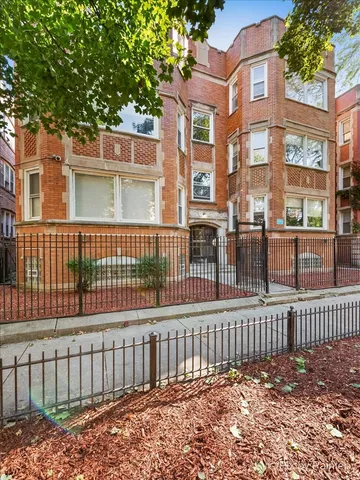 a view of a brick building from a deck