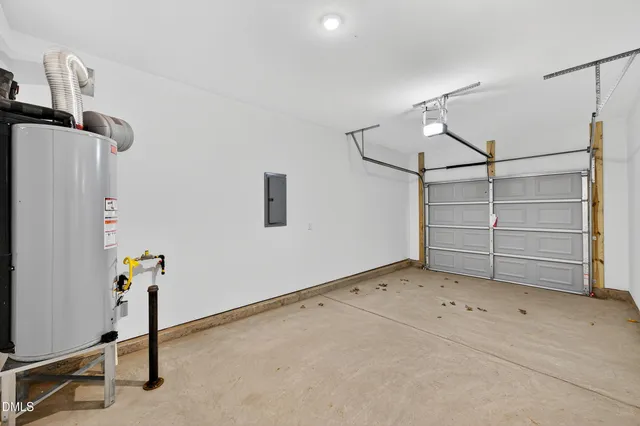 a view of room with furniture and a window