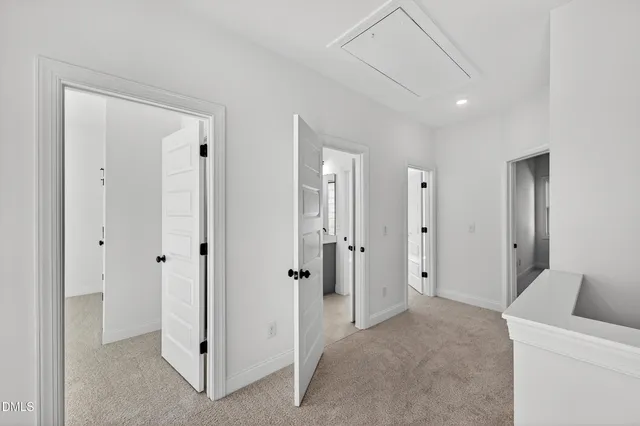 a view of a livingroom with a hallway