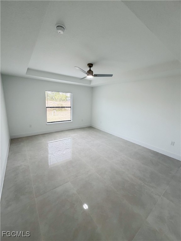2800 46th Street Southwest Lehigh Acres, FL 33976 - Photo 13 of 15 an empty room with windows and cabinet
