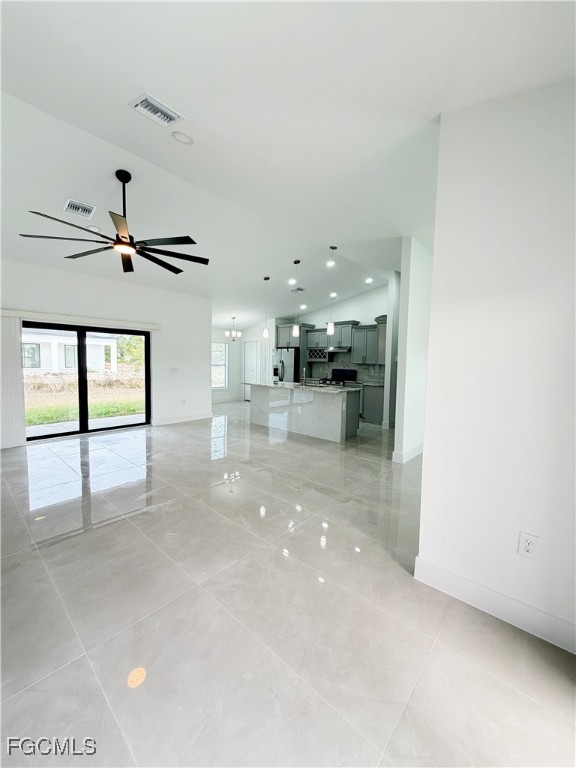 2800 46th Street Southwest Lehigh Acres, FL 33976 - Photo 3 of 15 a view of a living room and chandelier