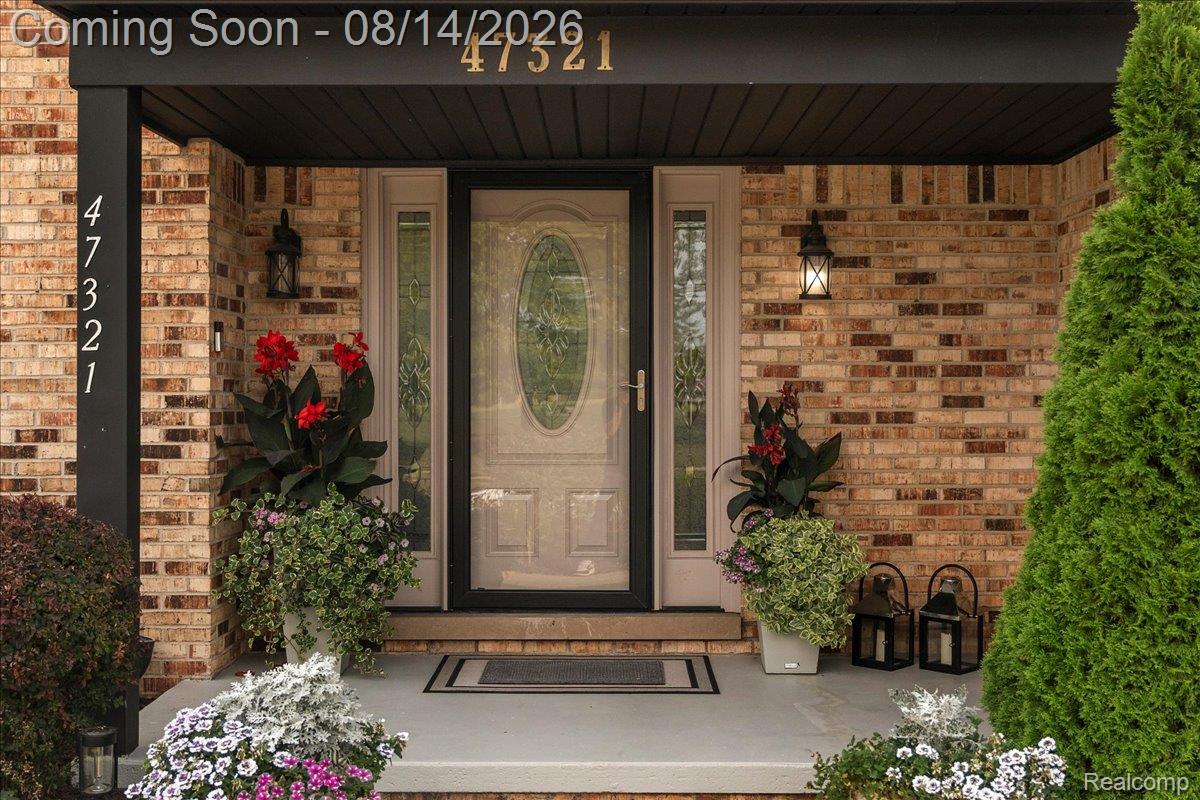 47321 Susan Road Macomb, MI 48044 - Photo 4 of 46 Brick facade with a covered entry