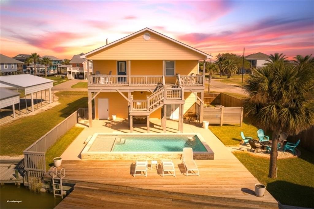 102 Ball Street Rockport, TX 78382 - Photo 29 of 40 a view of a swimming pool with a patio
