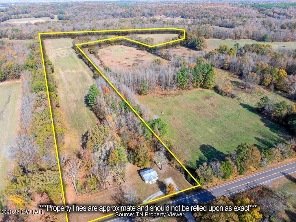 8405 Highway 77 Huntingdon, TN 38344 - Photo 3 of 37 a view of swimming pool with a yard and seating space