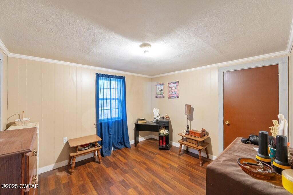 8405 Highway 77 Huntingdon, TN 38344 - Photo 8 of 37 a bedroom with furniture and a window