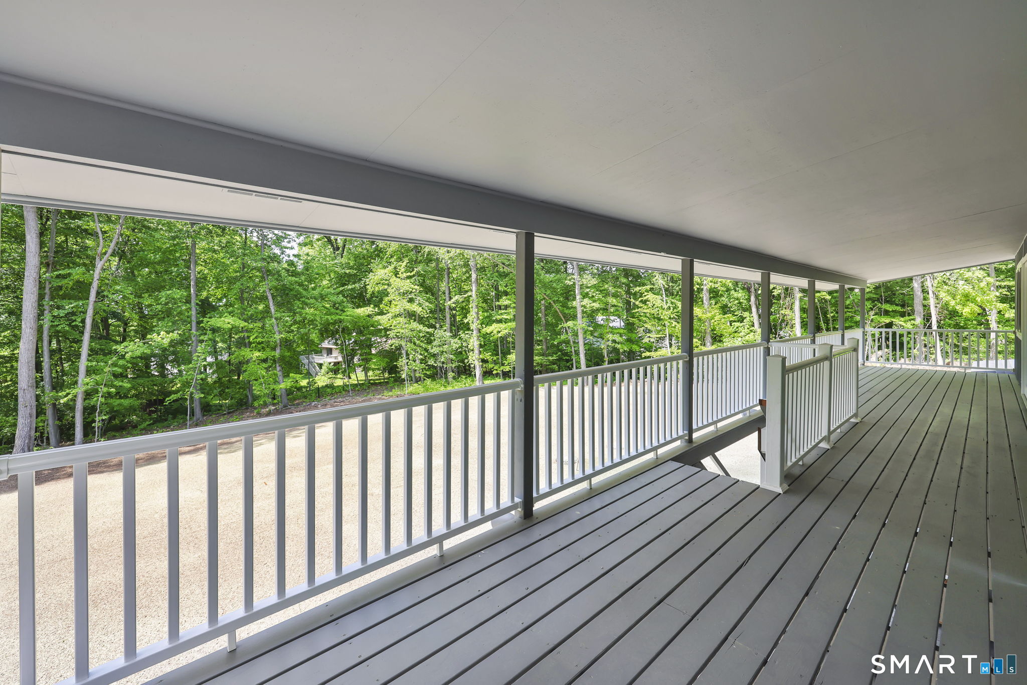 49 Millstone Road Glastonbury, CT 06033 - Photo 12 of 39 a view of balcony with wooden floor