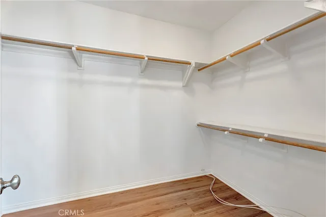 a view of a room with racks on the wall