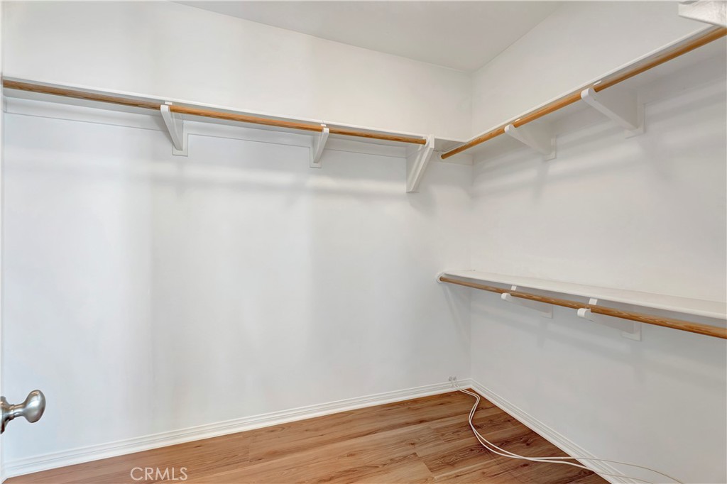 110 Mosswood Irvine, CA 92620 - Photo 19 of 38 a view of a room with racks on the wall