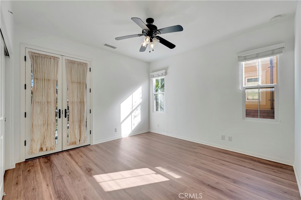 110 Mosswood Irvine, CA 92620 - Photo 23 of 38 wooden floor in an empty room with a window