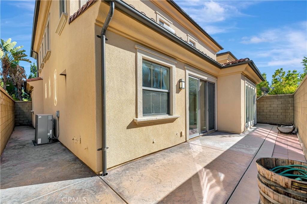 110 Mosswood Irvine, CA 92620 - Photo 28 of 38 a view of house with backyard