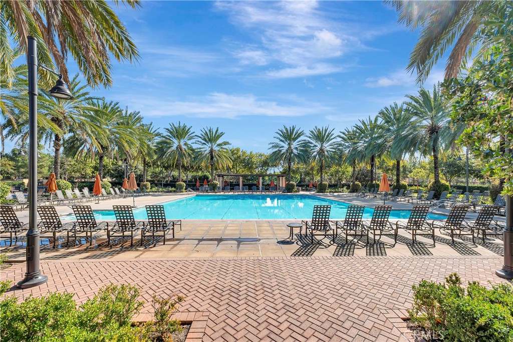 110 Mosswood Irvine, CA 92620 - Photo 29 of 38 a view of a swimming pool with outdoor seating