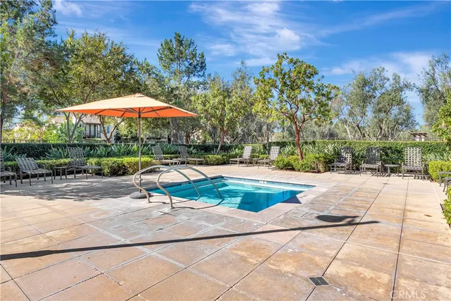 a view of backyard with a patio