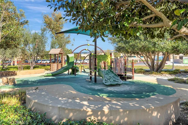 a view of a garden with houses