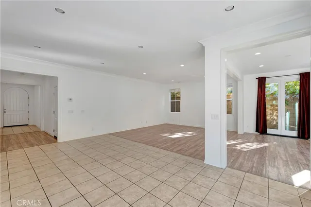 a view of an empty room and window