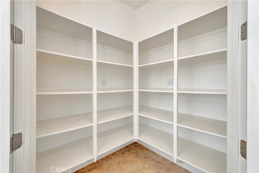 110 Mosswood Irvine, CA 92620 - Photo 9 of 38 a view of an empty room with empty racks