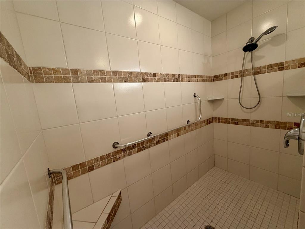 1020 2nd Avenue Northwest Largo, FL 33770 - Photo 19 of 37 a bathroom with a shower and a shower