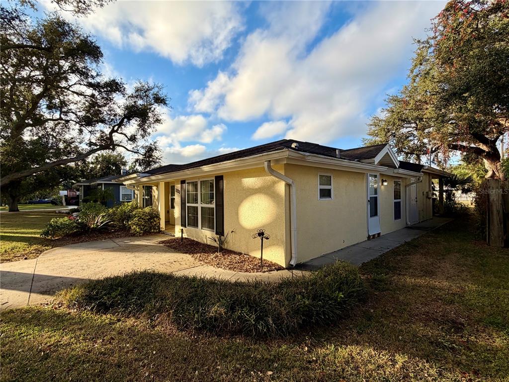 1020 2nd Avenue Northwest Largo, FL 33770 - Photo 2 of 37 a view of a house with backyard and sitting area