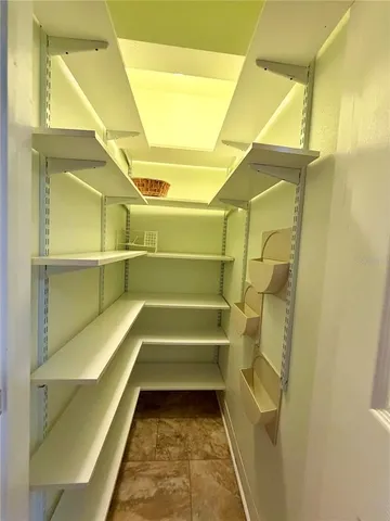 a view of a livingroom with furniture