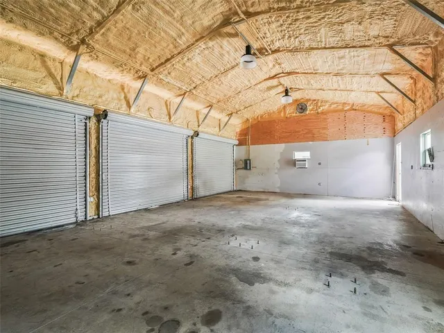 a view of a backyard with a garden