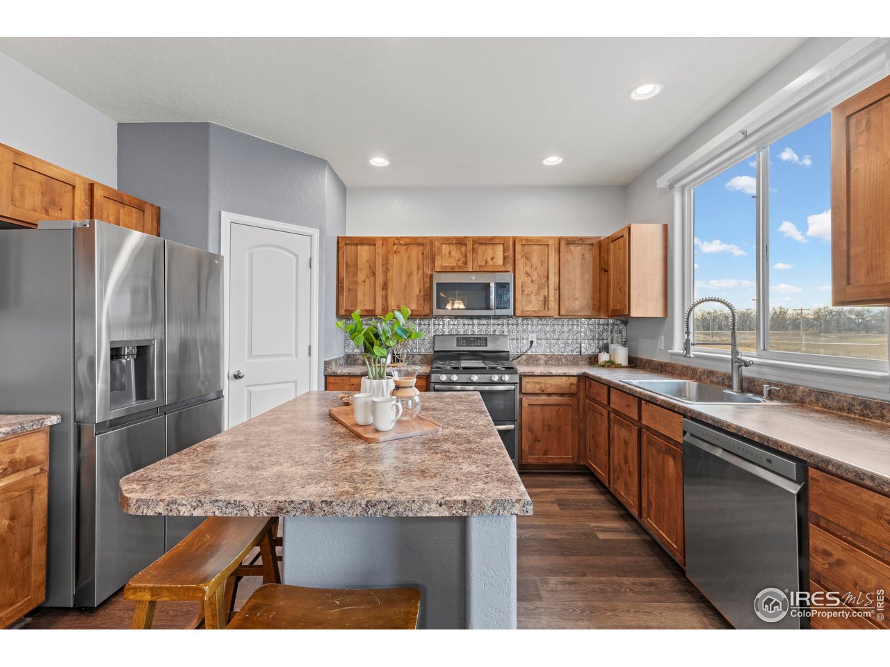 765 Rodgers Circle Platteville, CO 80651 - Photo 12 of 45 Walk-in pantry and SS appliances!