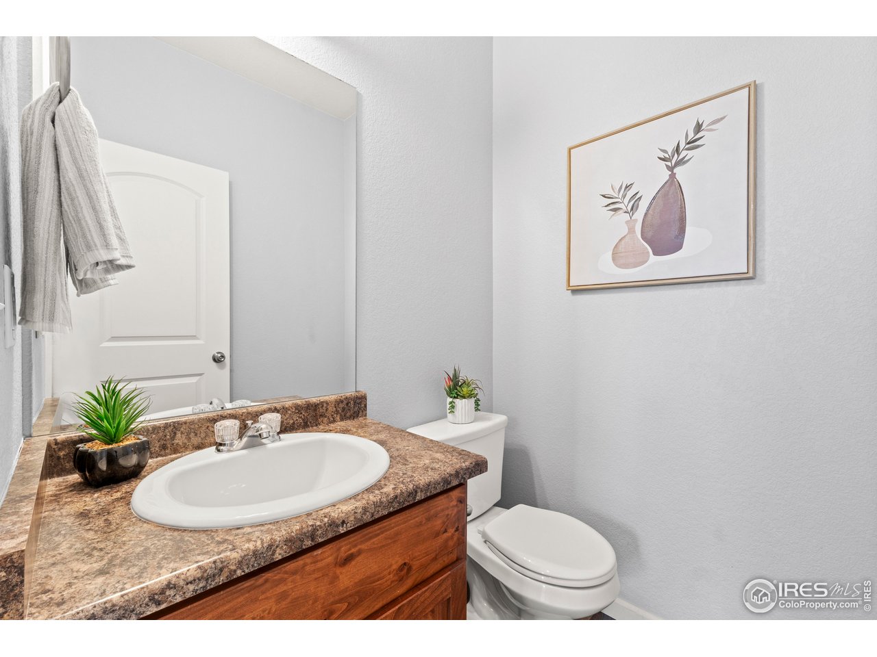 765 Rodgers Circle Platteville, CO 80651 - Photo 15 of 45 Main floor 1/2 bath