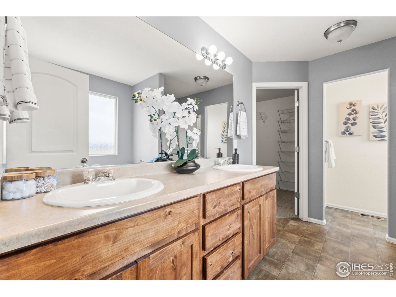 765 Rodgers Circle Platteville, CO 80651 - Photo 19 of 45 5-piece full primary bathroom with enclosed water closet