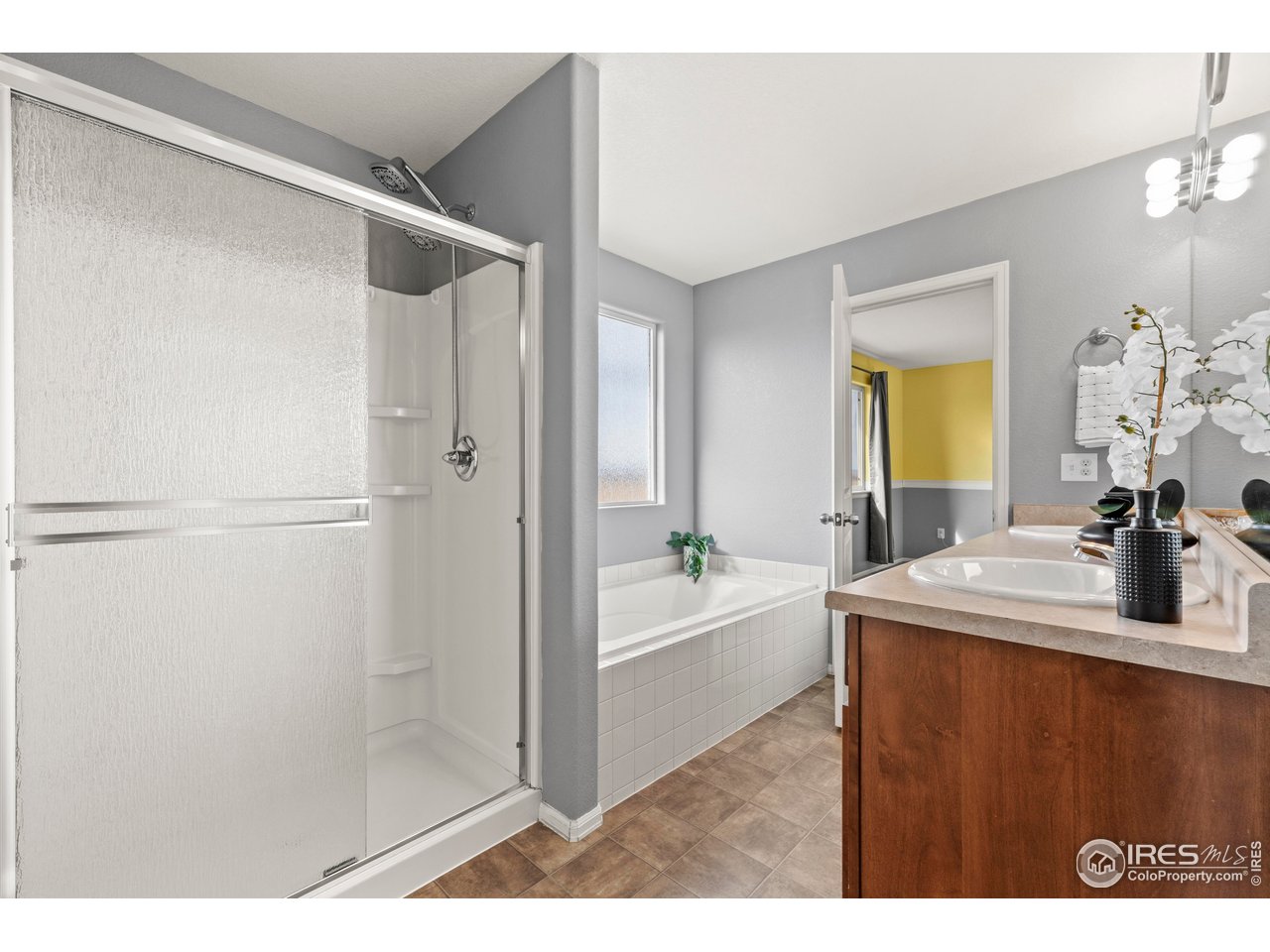 765 Rodgers Circle Platteville, CO 80651 - Photo 20 of 45 Primary bath with more views!