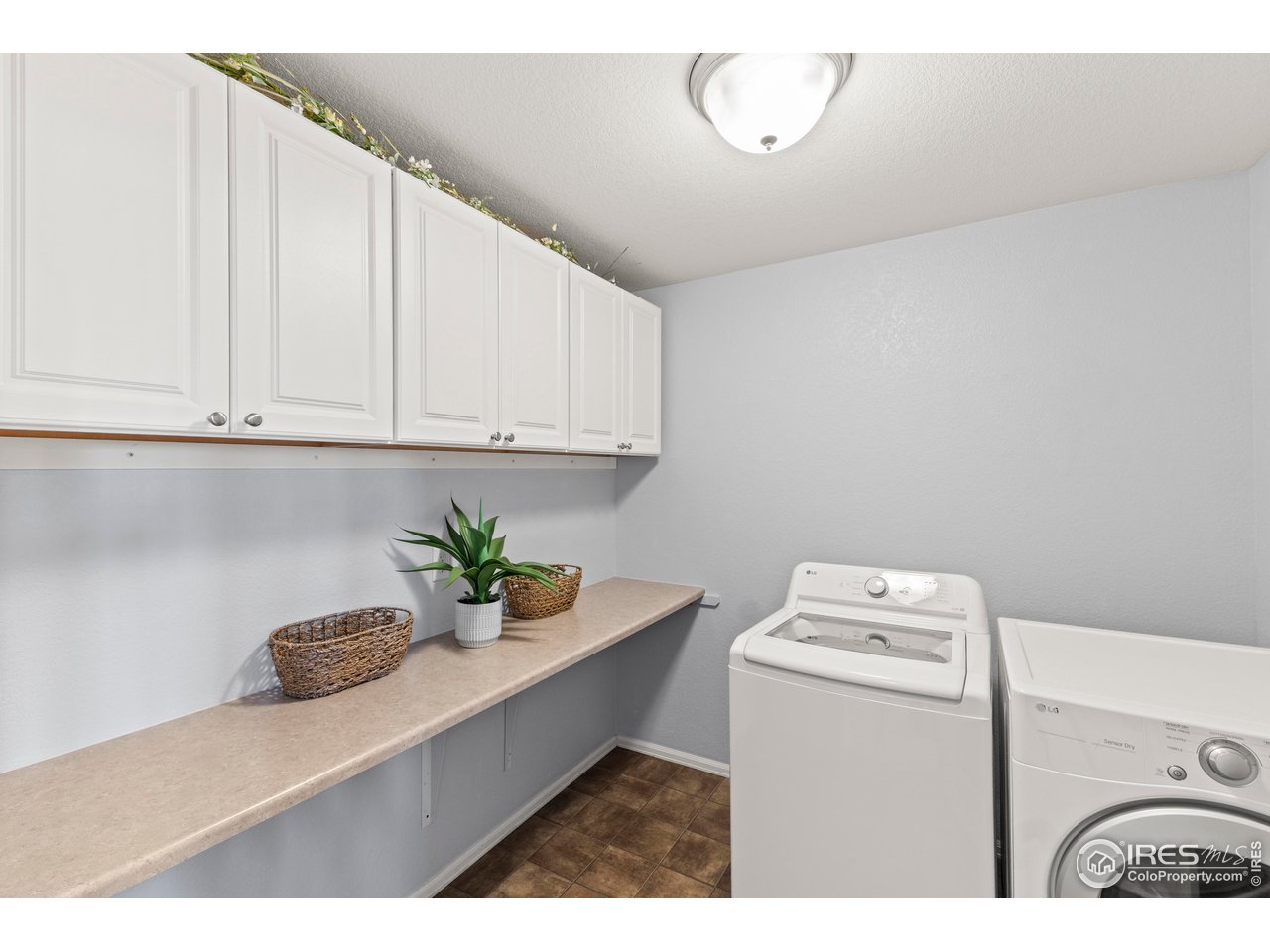 765 Rodgers Circle Platteville, CO 80651 - Photo 22 of 45 Generous laundry on the upper level! Washer and dryer included!