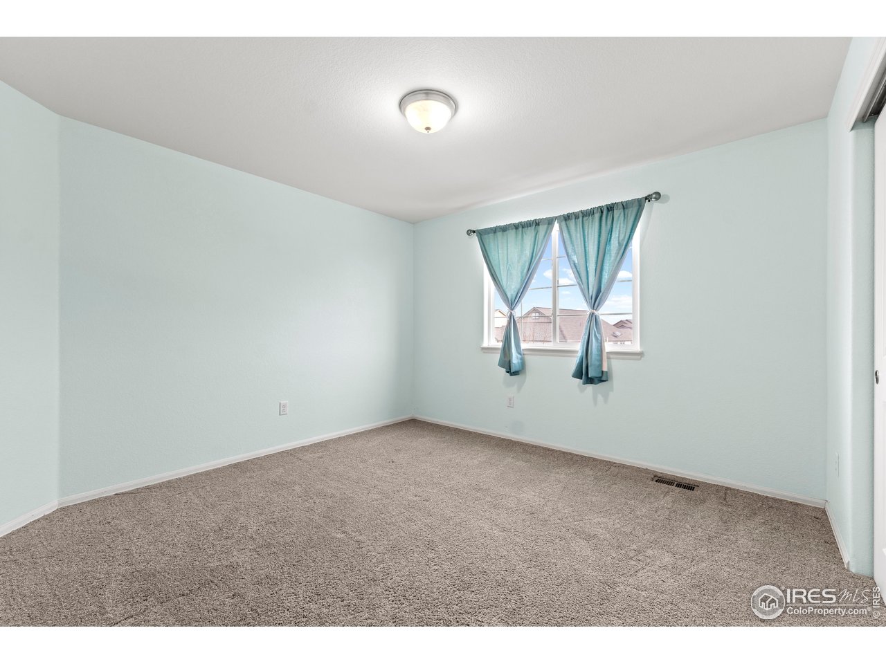 765 Rodgers Circle Platteville, CO 80651 - Photo 23 of 45 Large Bedroom #2