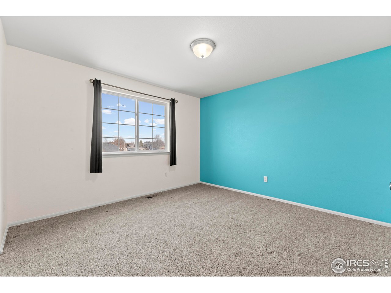 765 Rodgers Circle Platteville, CO 80651 - Photo 25 of 45 Large Bedroom #3