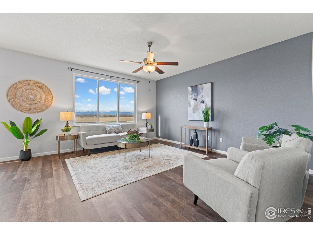 765 Rodgers Circle Platteville, CO 80651 - Photo 6 of 45 Spacious family and living room with abundant natural light!