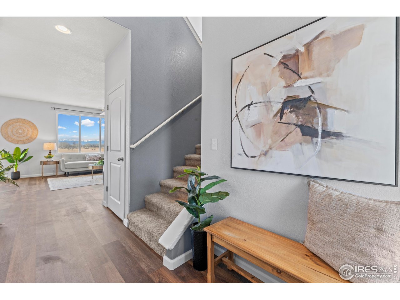 765 Rodgers Circle Platteville, CO 80651 - Photo 7 of 45 Views of the Front Range upon entry through the front door!