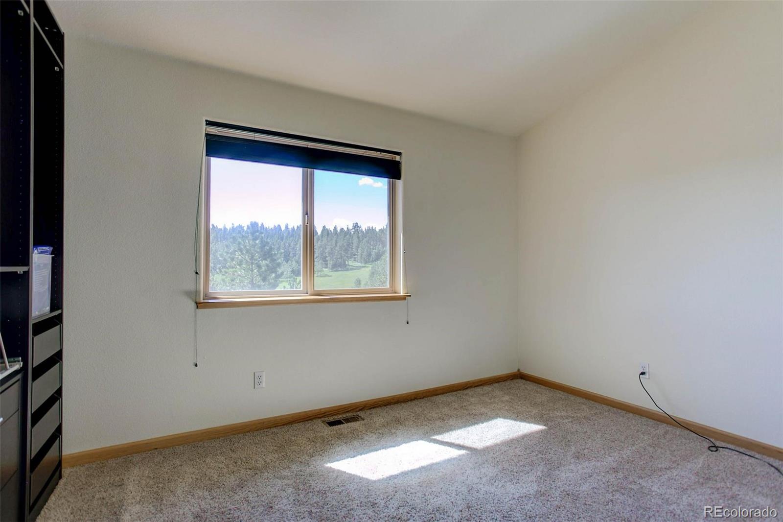 29 Pine Trail Bailey, CO 80421 - Photo 17 of 30 an empty room with a window