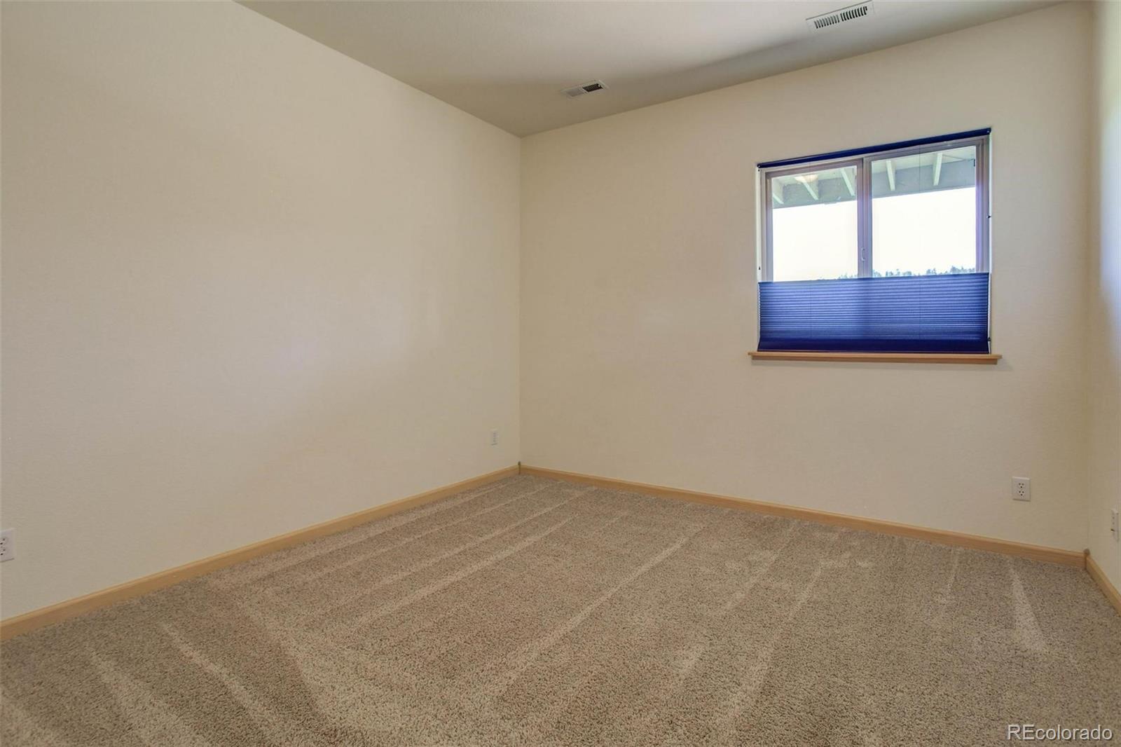 29 Pine Trail Bailey, CO 80421 - Photo 21 of 30 an empty room with a window