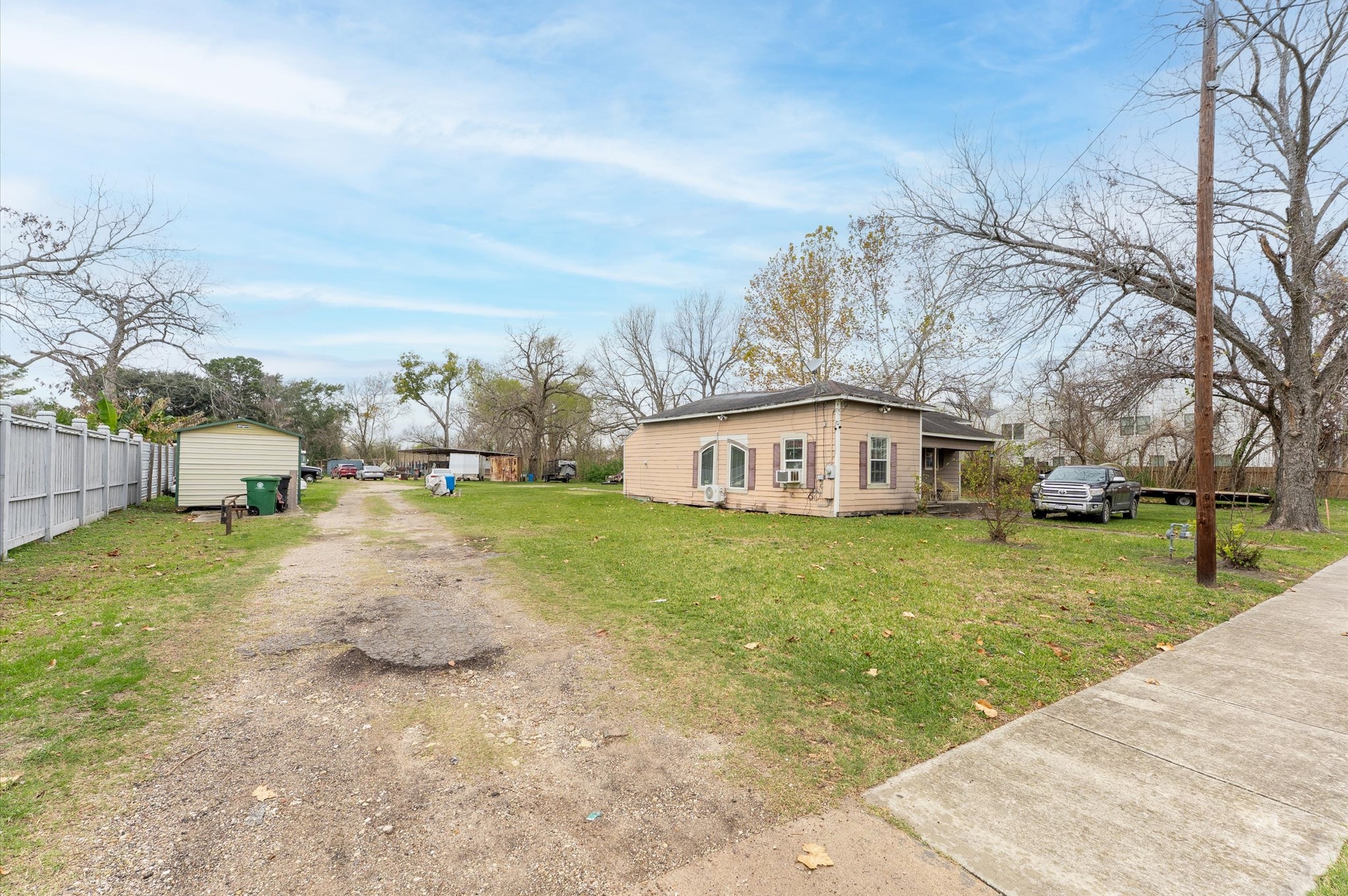 6415 Knox Street Houston, TX 77091 - Photo 2 of 12 a view of a house with a yard