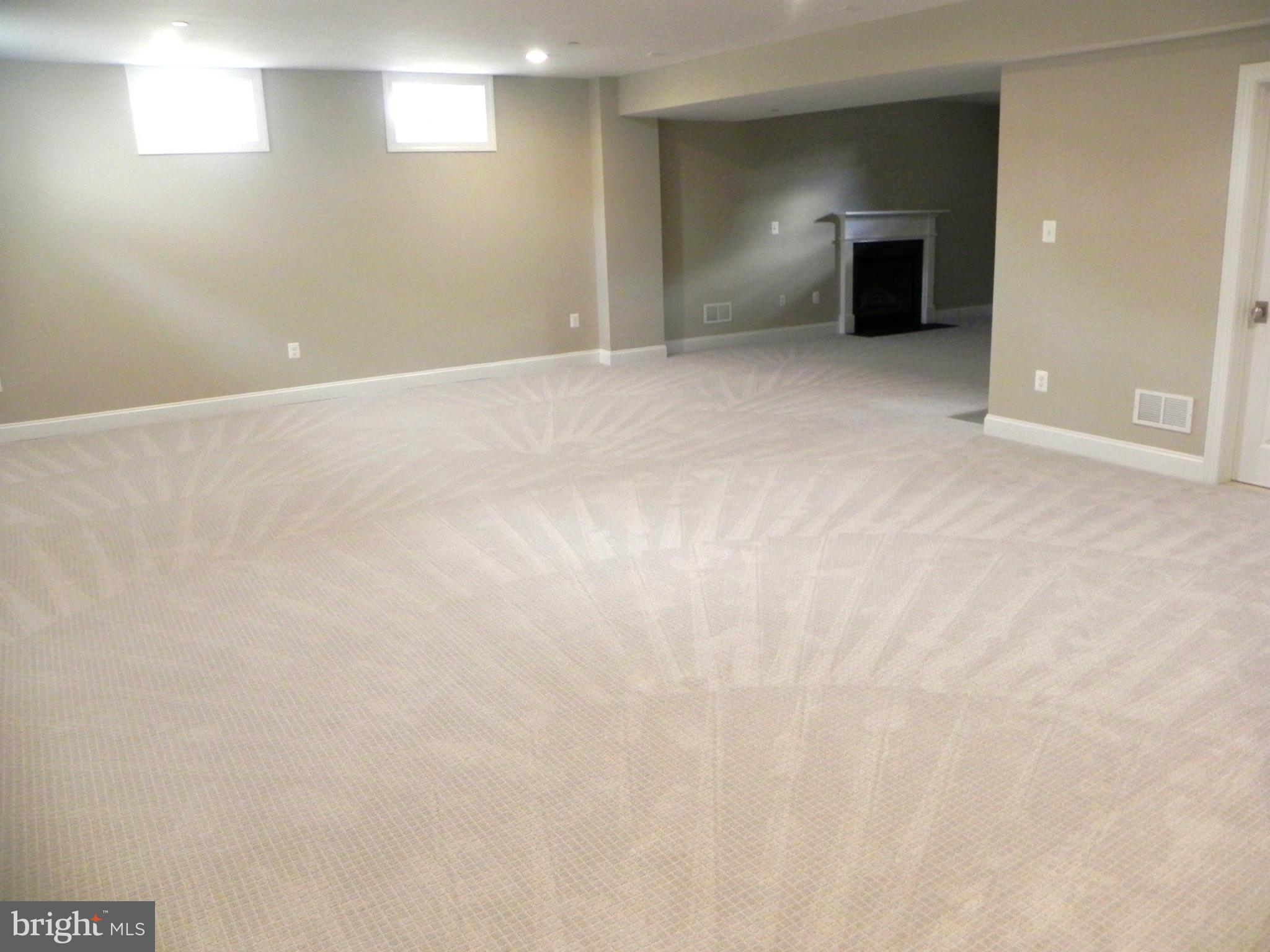 2 Chase Road Annapolis, MD 21409 - Photo 22 of 29 Large finished basement with high ceilings.