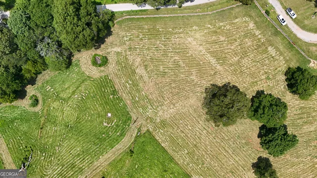 a bathroom with a small yard and green space