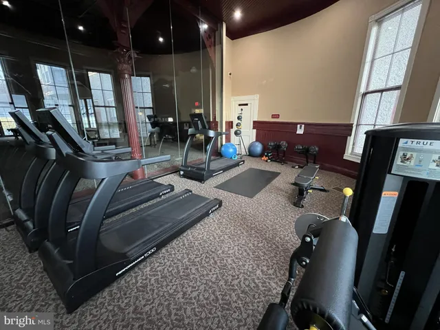 a view of a room with gym equipment