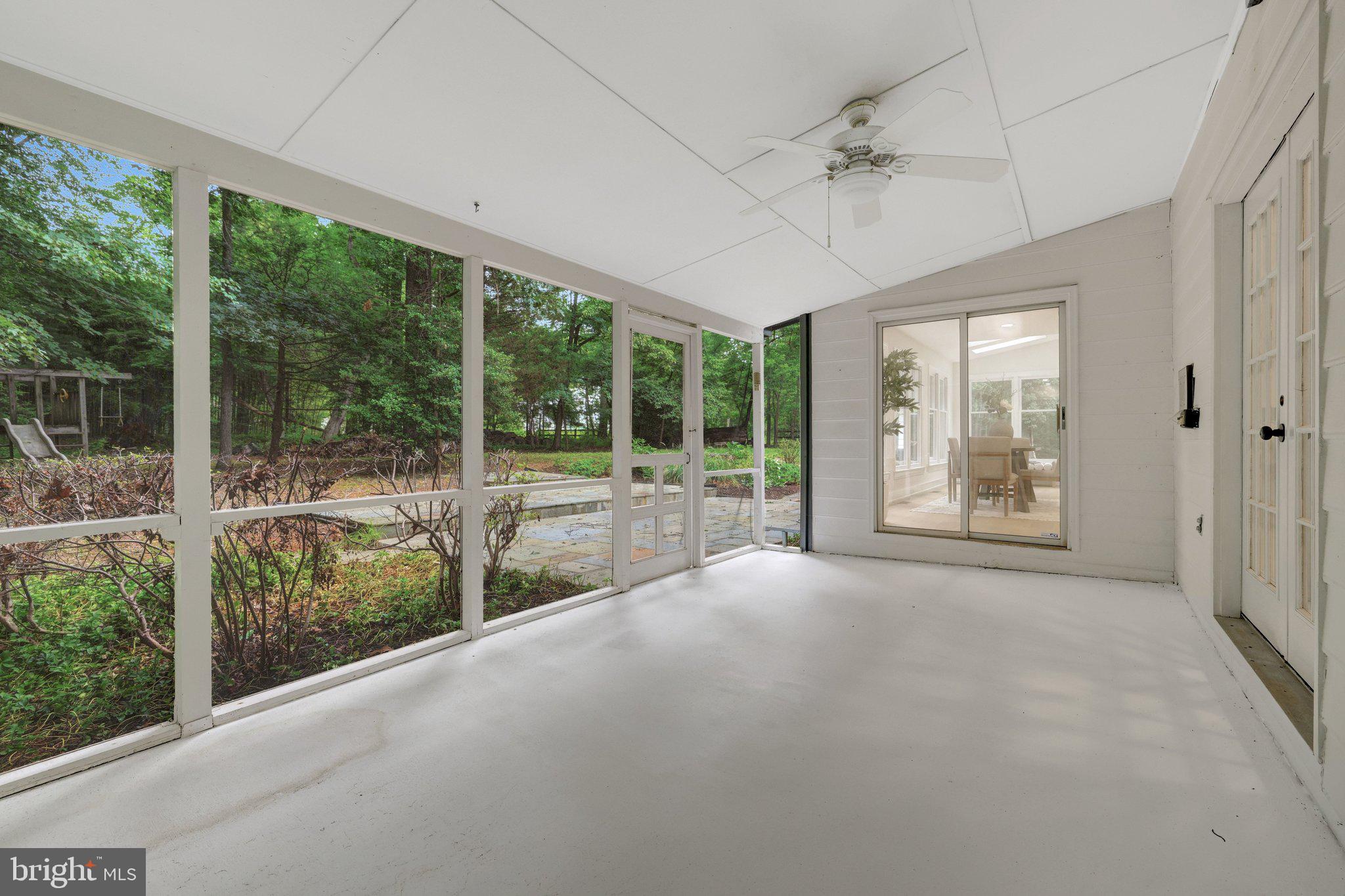 1132 Springvale Road Great Falls, VA 22066 - Photo 62 of 81 Serene screened porch with nature views.