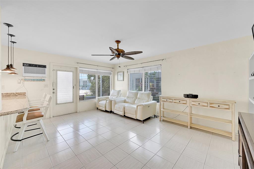 1110 North Riverside Drive, Unit 14 Pompano Beach, FL 33062 - Photo 23 of 56 This is Your Spacious Living Room Conveniently Located Adjacent to Your Open Kitchen & Snack Bar, BOTH ARE 1st Floor Complete with POOLSIDE VIEWS! BEING SOLD FURNISHED & NEGOTIABLE!