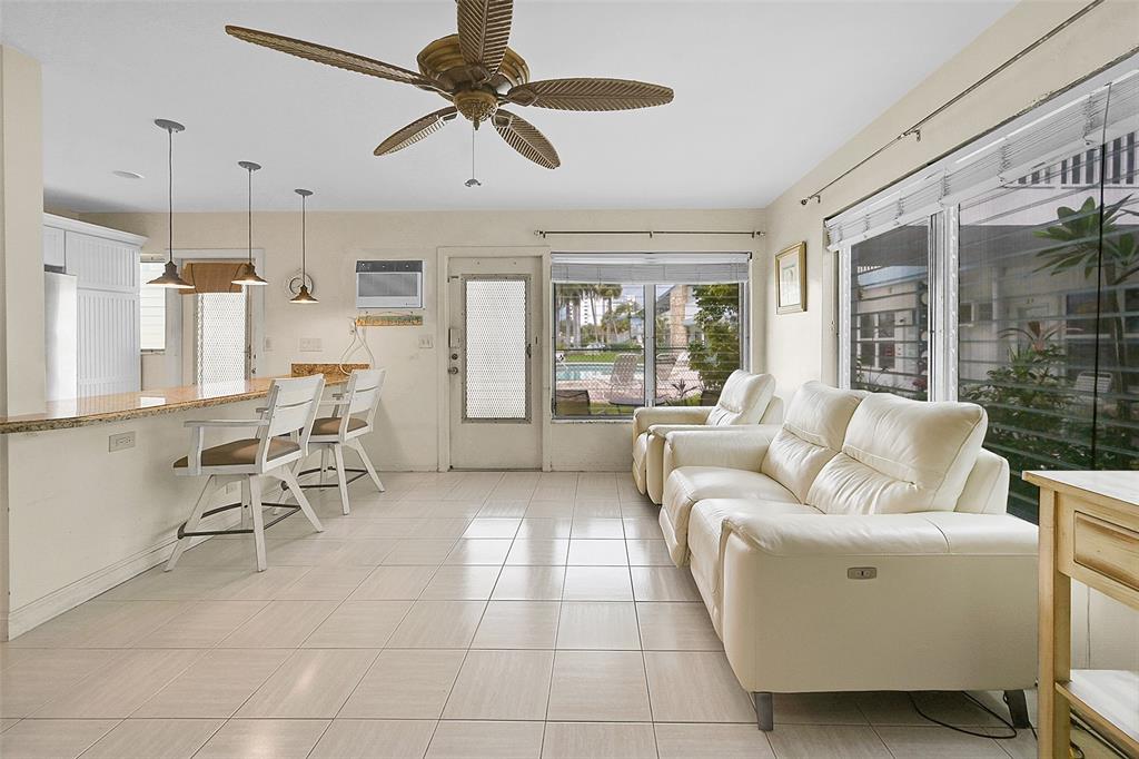 1110 North Riverside Drive, Unit 14 Pompano Beach, FL 33062 - Photo 24 of 56 Relax, Unwind, Entertain, Read and Enjoy Your Guests Living In This 1st Floor Corner Unit, POOLSIDE VIEWS. Imagine This is Your Future Living Room with These Beautiful POOLSIDE VIEWS.