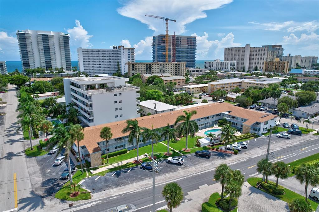 1110 North Riverside Drive, Unit 14 Pompano Beach, FL 33062 - Photo 46 of 56 Assessment Work Completed & Building Repainted Sept. 2024! Sun Set Co-Op Apts is a Charming 2 Story Boutique Building and Community and in a LOCATION THAT CAN'T BE BEAT. Enjoy a Heated Pool, Covered Cabana and BBQ Area Poolside, there is even a Cabana Bathroom next to the Pool for your convenience.