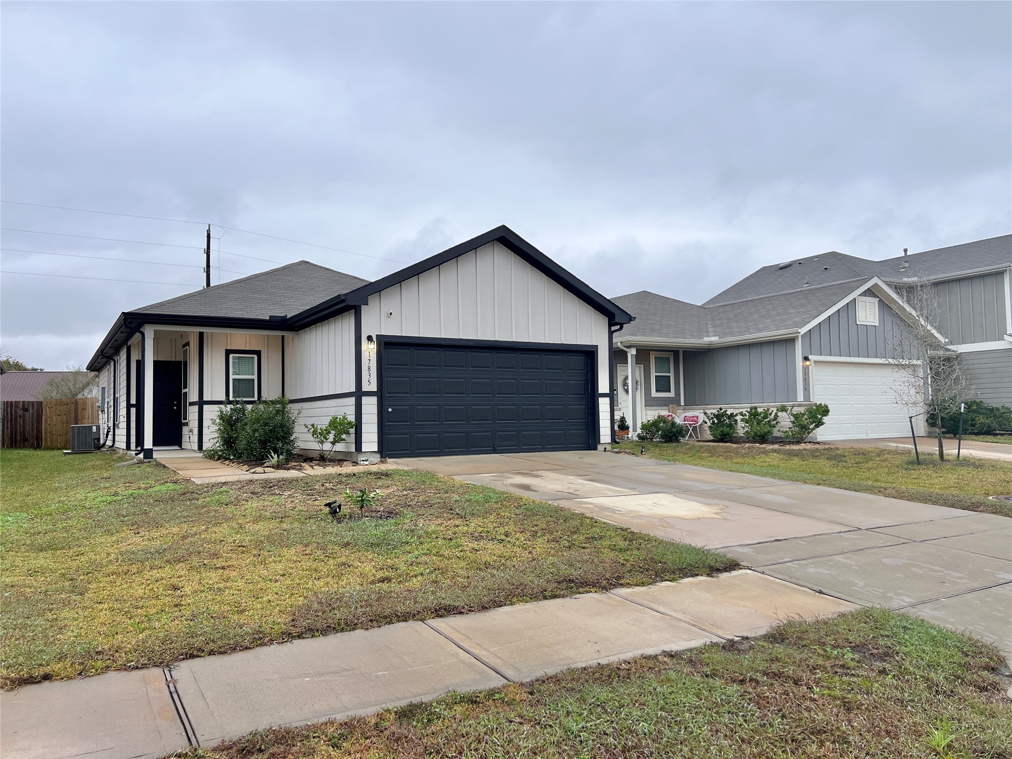 17835 Plow Horse Lane Hockley, TX 77447 - Photo 1 of 41 a front view of a house with a yard and garage