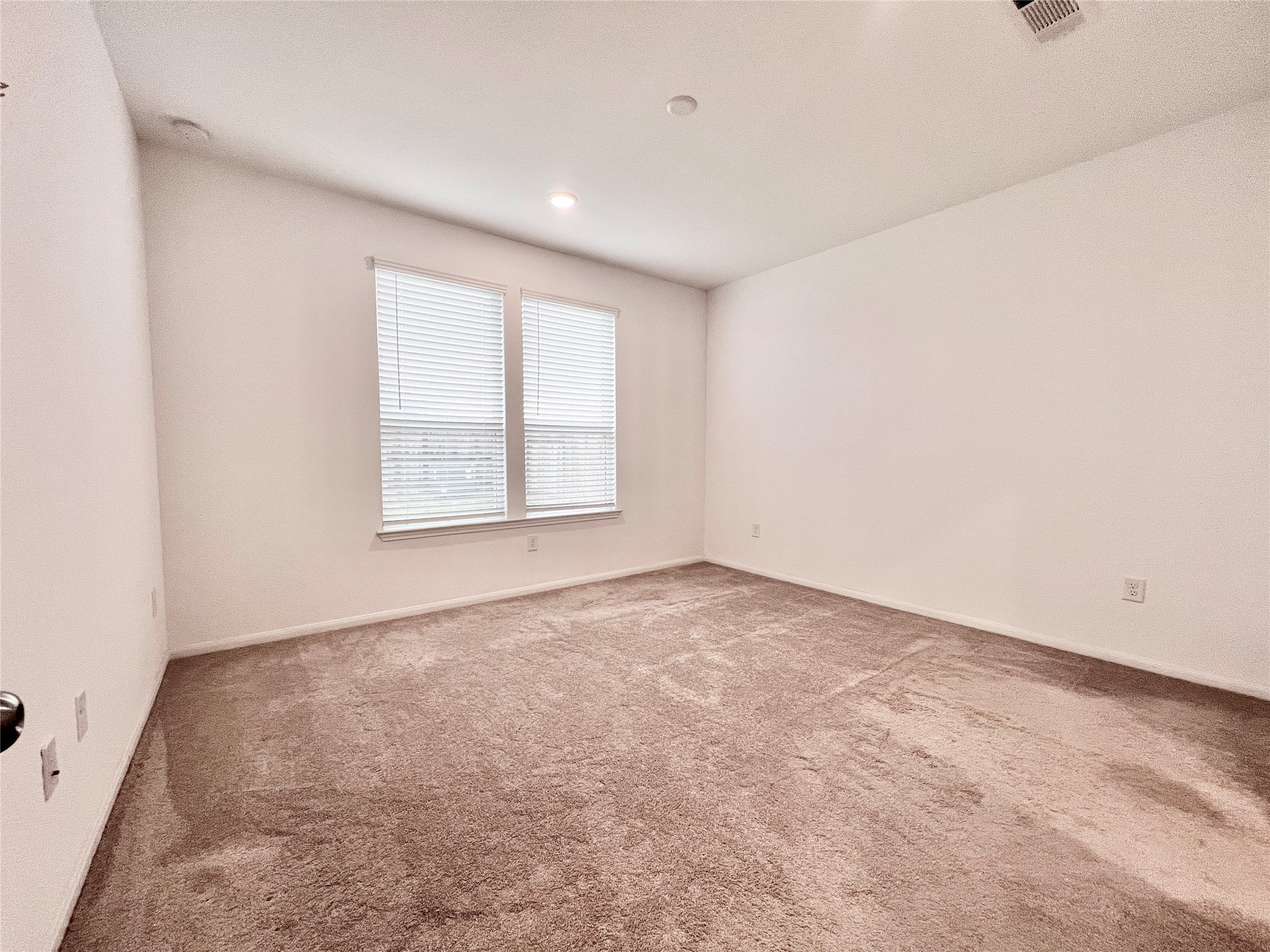 17835 Plow Horse Lane Hockley, TX 77447 - Photo 11 of 41 an empty room with windows