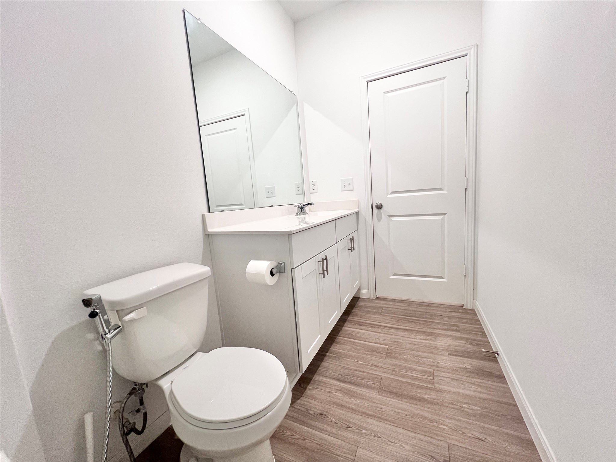 17835 Plow Horse Lane Hockley, TX 77447 - Photo 24 of 41 a bathroom with a toilet a sink and mirror