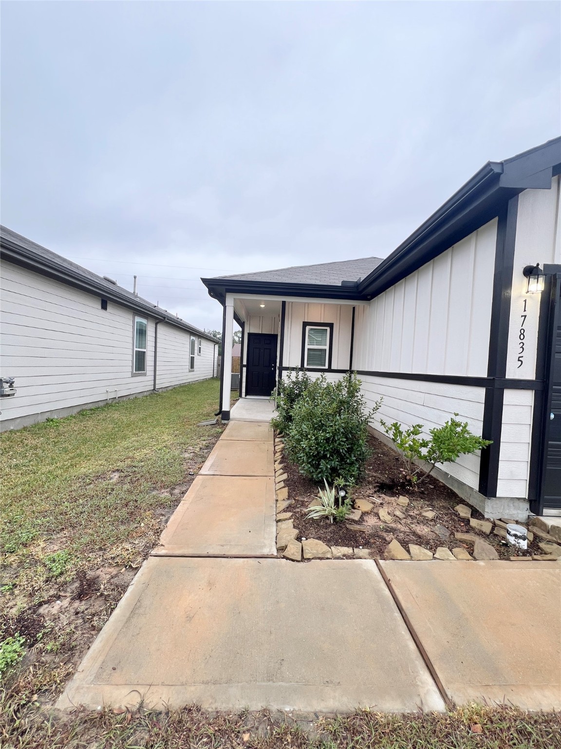 17835 Plow Horse Lane Hockley, TX 77447 - Photo 3 of 41 a house with yard and a large parking space