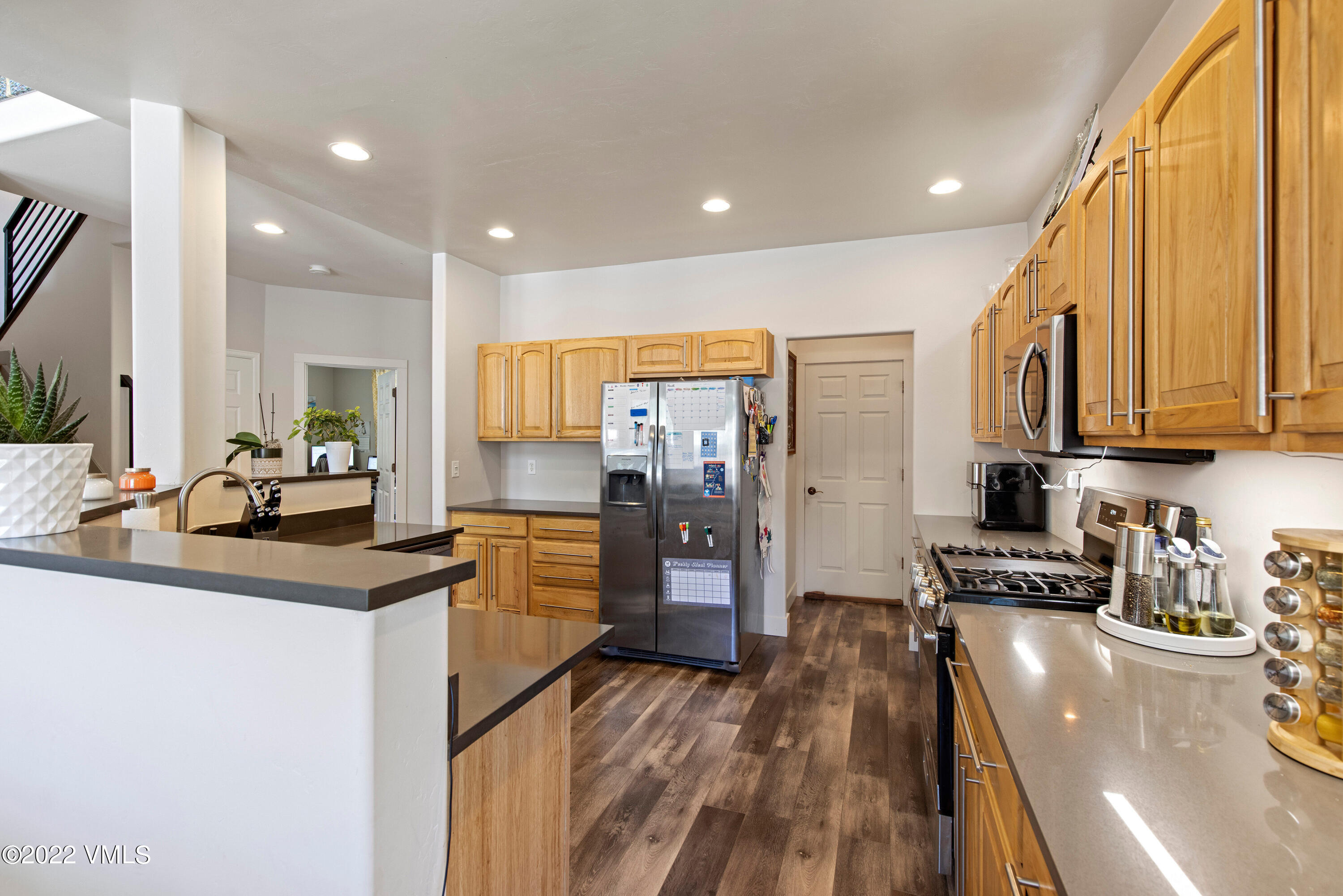 40 Eagle Ranch Road Eagle, CO 81631 - Photo 11 of 38 a kitchen with stainless steel appliances granite countertop refrigerator sink and stove