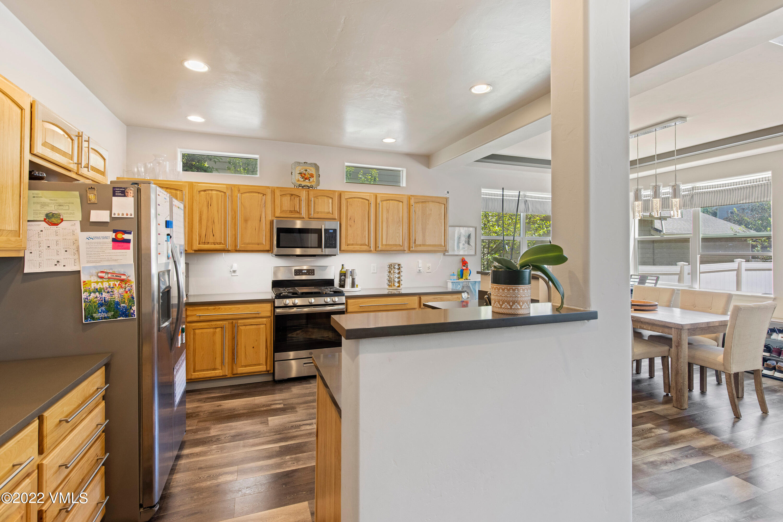 40 Eagle Ranch Road Eagle, CO 81631 - Photo 15 of 38 a kitchen with stainless steel appliances a sink stove and refrigerator